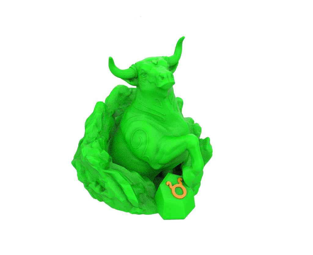 Green bull figurine on a white background